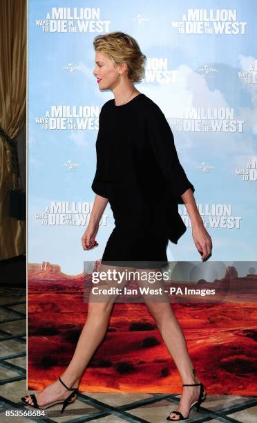 Charlize Theron attending a photocall for the film A Million Ways to Die in the West at Claridge's Hotel in London.