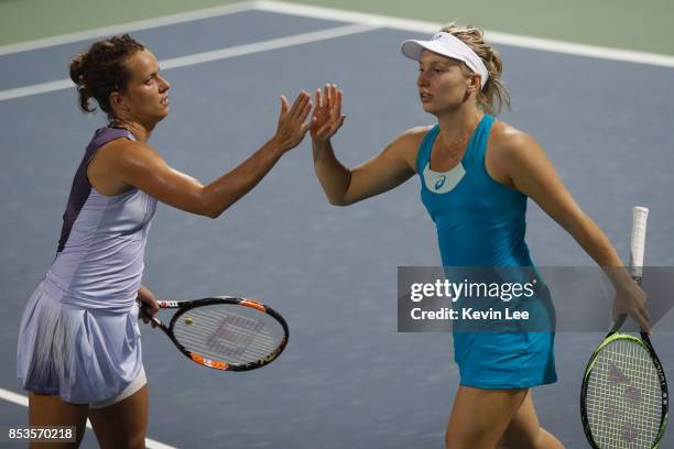 Daria Gavrilova of Australia and Barbora Strycova of Czech Republic celebrate a point during the Ladies Doubles first round match against Nicole...