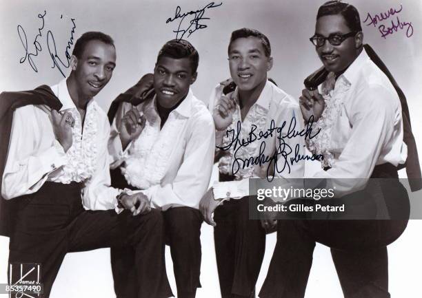 Photo of MIRACLES and Smokey ROBSINSON and Bobby ROGERS and Pete MOORE and Ronald WHITE; Posed group portrait of The Miracles L-R Ronald White, Pete...