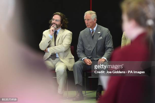 The Prince of Wales watches a performance of Henry IV Part I by secondary school students from Stratford-up-Avon alongside artistic director Gregory...