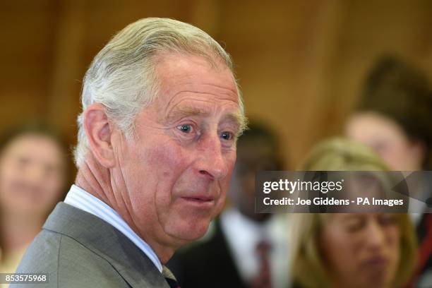 The Prince of Wales watches a performance of Henry IV Part I by secondary school students from Stratford-up-Avon at The Royal Shakespeare Theatre...