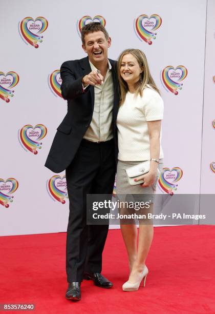 Matthew Wright arrives with his wife Amelia at the Savoy Hotel, London, to attend the Health Lottery Tea Party charity fundraiser.