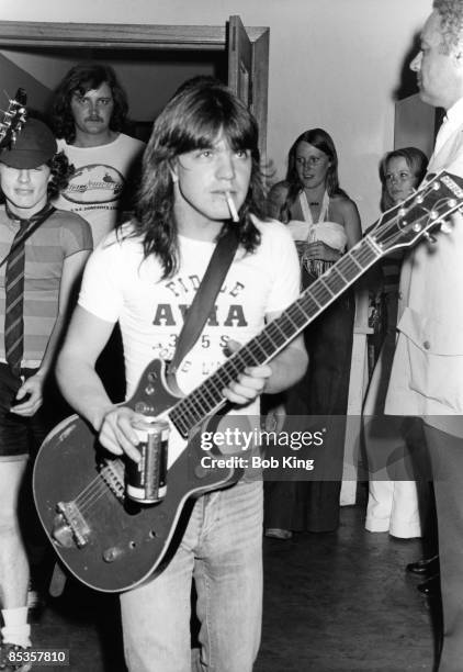 Photo of AC/DC and Malcolm YOUNG and Angus YOUNG; Malcolm Young and Angus Young backstage