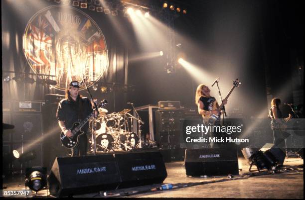 Photo of LEMMY and Philip CAMPBELL and MOTORHEAD; L-R: Phil Campbell, Lemmy, Wurzel performing live on stage