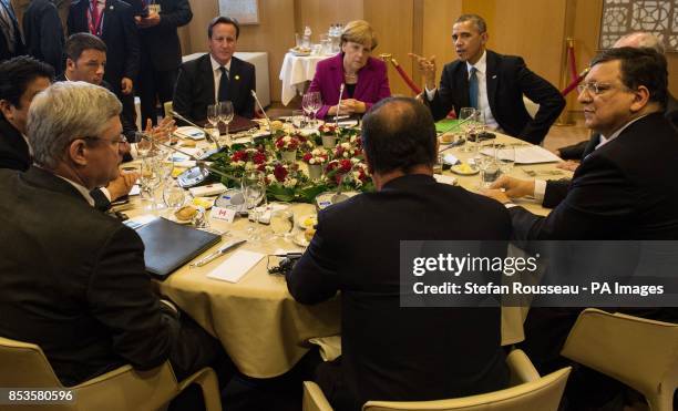 Leaders of the G7 group of industrialised nations including Prime Minister David Cameron, German Chancellor Angela Merkel and US President Barack...