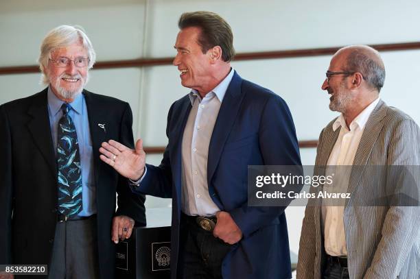 Jean Michel Cousteau, Arnold Schwarzenegger and Jean Jacques Mantello attend the 'Wonder Of The Sea 3D' photocall at the Kursaal Palace during the...