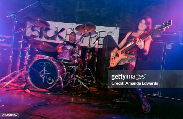 Photo of Sick Puppies in Los Angeles, Mark Goodwin and Emma Anzai of the Sick Puppies perform onstage at the Troubadour in West Hollywood,...