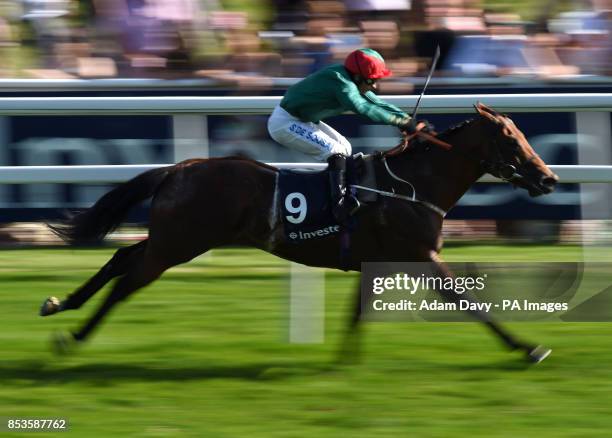 Almargo ridden by Silvestre De Sousa wins The Investec Asset Management Handicap during Investec Ladies Day at Epsom Downs Racecourse, Surrey.