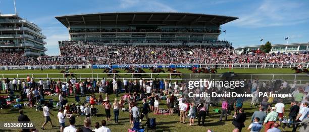 Almargo ridden by Silvestre De Sousa wins the Investec Asset Management Handicap during Investec Ladies Day at Epsom Downs Racecourse, Surrey.