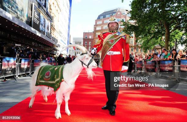 Sergeant 'Jacko' Jackson, Goat Major, with Shenkin, the regimental mascot of the 3rd Battalion, attending the 50th anniversary screening of Zulu at...