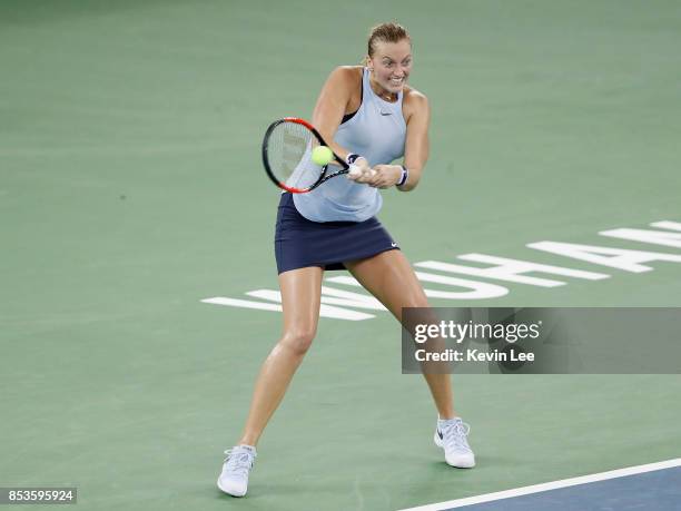 Petra Kvitova of Czech Republic returns a shot to Peng Shuai of China in round 1 during Day 2 of 2017 Wuhan Open on September 25, 2017 in Wuhan,...