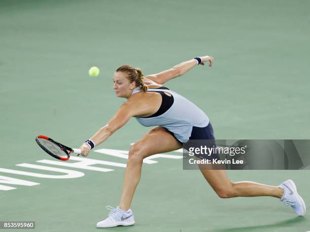 Petra Kvitova of Czech Republic returns a shot to Peng Shuai of China in round 1 during Day 2 of 2017 Wuhan Open on September 25, 2017 in Wuhan,...