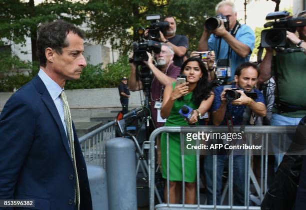 Anthony Weiner, a former Democratic congressman leaves Federal Court in New York September 25, 2017 after being sentenced for 21-months for sexting...