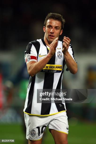 Alessandro Del Piero of Juventus applaudes the fans after defeat in the UEFA Champions League, First knock-out round, second leg match between...