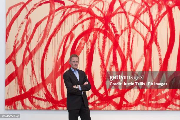 Director of the Tate Sir Nicholas Serota in front of Untitled 2006-2008, Acrylic on canvas, by Cy Twombly, at Tate Modern in central London after it...