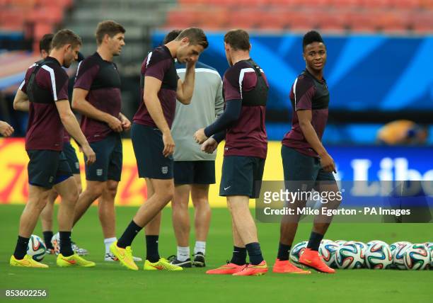 England's Raheem Sterling with team mates during a training session at the Arena da Amazonia, Manaus, Brazil.