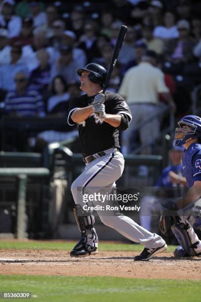 Paul Konerko of the Chicago White Sox bats during the game against the Texas Rangers on March 7, 2009 at Surprise Stadium in Surprise, Arizona.