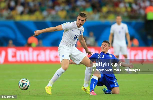 England's Jordan Henderson and Italy's Marco Verratti battle for the ball during the FIFA World Cup, Group D match at the Arena da Amazonia, Manaus,...