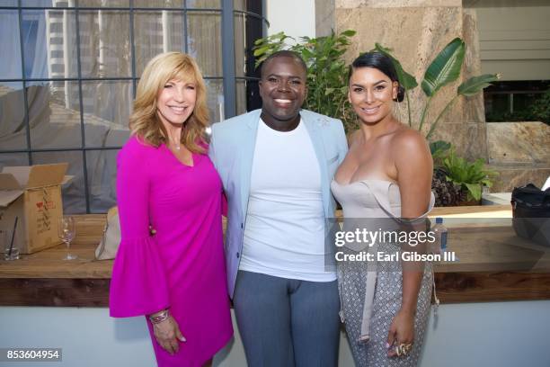 Leeza Gibbon, Robert Harrell and Laura Govan pose for a photo at the Breaking The Silence Awards on September 24, 2017 in Santa Monica, California.