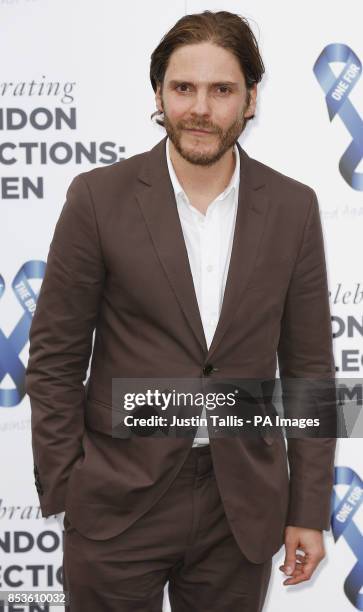 Daniel Bruhl arrives at One For The Boys charity fashion ball in London.