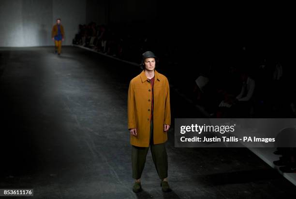 Model on the catwalk during the Oliver Spencer show at the British Fashion Council's 2014 London Collections: Men fashion show at The Old Sorting...