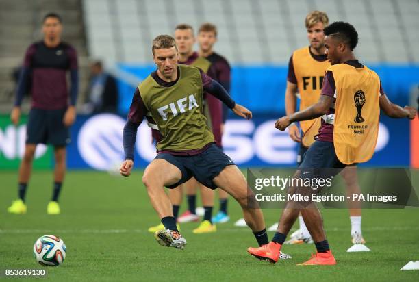 England's Rickie Lambert and Raheem Sterling during a training session at the Estadio do Sao Paulo, Sao Paulo, Brazil.