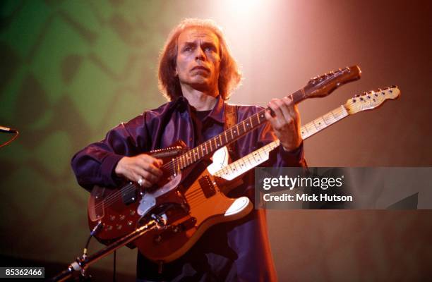 Photo of Steve HOWE and YES; Steve Howe performing live onstage, playing Coral Electric Sitar