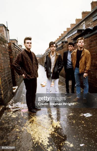 Photo of Andy ROURKE and Johnny MARR and Mike JOYCE and MORRISSEY and The Smiths; L-R: Morrissey, Johnny Marr, Mike Joyce, Andy Rourke - posed, group...