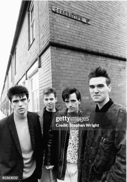 Photo of The Smiths and Mike JOYCE and Johnny MARR and Andy ROURKE and MORRISSEY; L-R: Mike Joyce, Andy Rourke, Johnny Marr, Morrissey - posed, group...