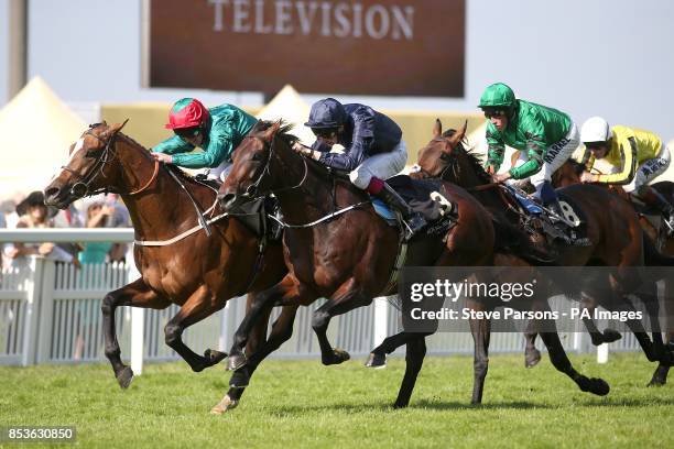 Hartnell ridden by Joe Fanning wins the Queen's Vase ahead of close second Century ridden by Joseph O'Brien during Day Four of the 2014 Royal Ascot...