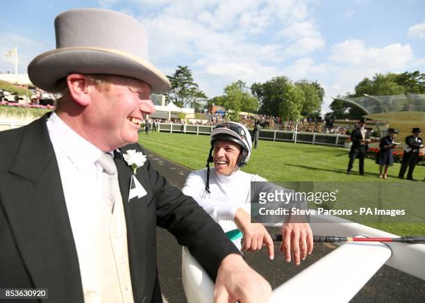 Jockey Frankie Dettori shares a laugh during Day Four of the 2014 Royal Ascot Meeting at Ascot Racecourse, Berkshire.