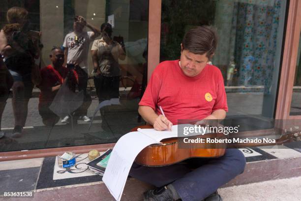 Omar Ramon Mirabal Jimenez better known as "El Muneco" is a street musician who has become a symbol of the city. He takes the money for eating and...