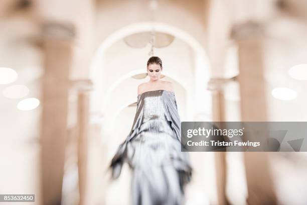 Model is seen backstage ahead of the Alberta Ferretti show during Milan Fashion Week Spring/Summer 2018 on September 20, 2017 in Milan, Italy.