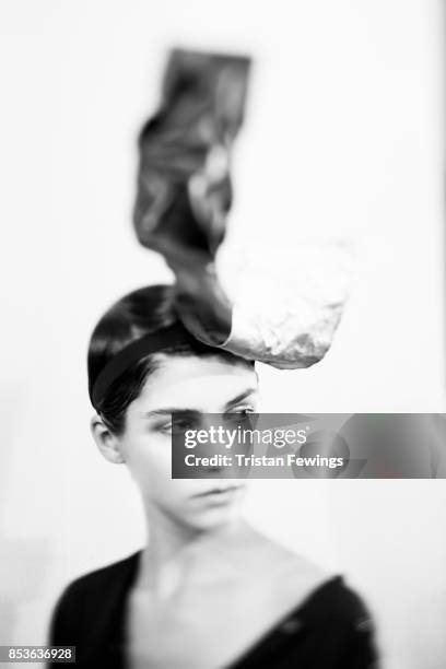 Model is seen backstage ahead of the Lucio Vanotti show during Milan Fashion Week Spring/Summer 2018 on September 21, 2017 in Milan, Italy.