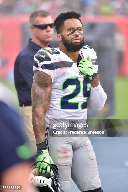 Earl Thomas of the Seattle Seahawks watches from the sideline during a game against the Tennessee Titans at Nissan Stadium on September 24, 2017 in...