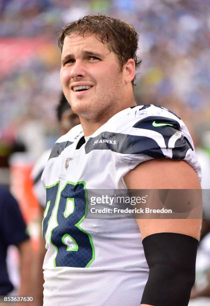Luke Joeckel of the Seattle Seahawks watches from the sideline during a game against the Tennessee Titans at Nissan Stadium on September 24, 2017 in...
