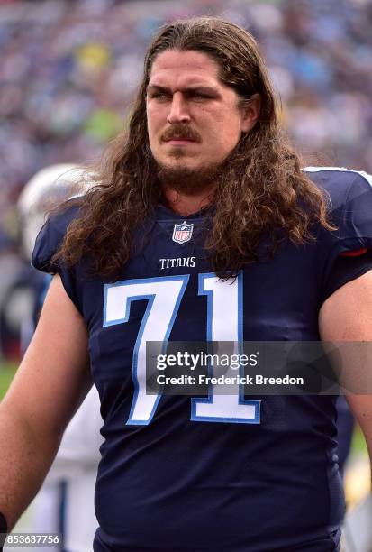 Dennis Kelly of the Tennessee Titans watches from the sideline during a game against the Seattle Seahawks at Nissan Stadium on September 24, 2017 in...