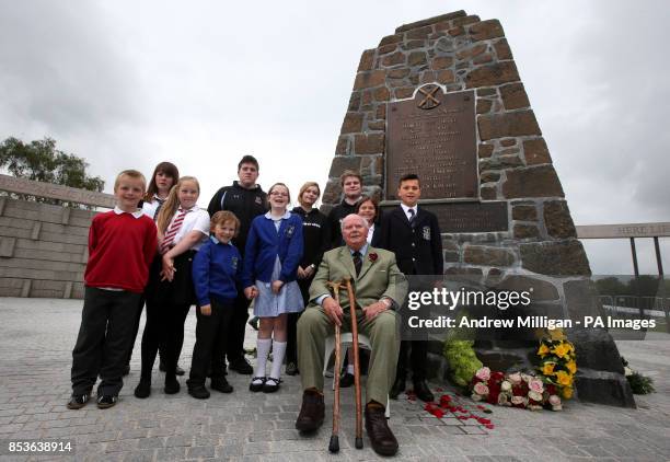 Lord Elgin, a direct descendant of Robert the Bruce, is joined by local children, as he sits beside the Borestone Cairn in the Rotunda, after a...