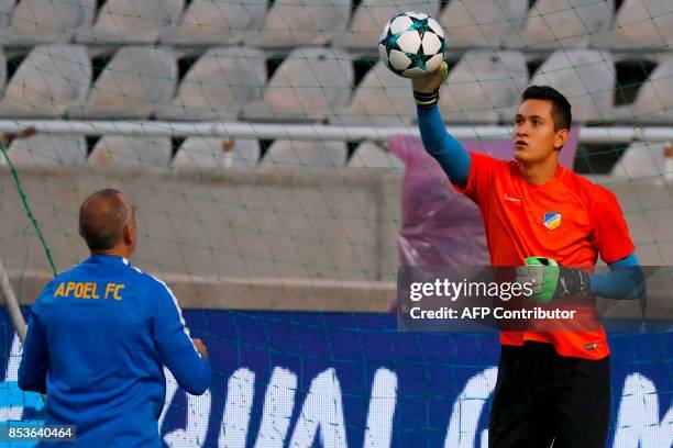 Apoel's Mexican goalkeeper Raul Gudino takes part in a training session at the GSP Stadium in Nicosia, on the eve of the UEFA Champions League Group...