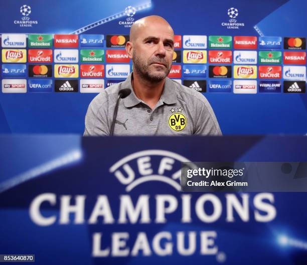 Head coach Peter Bosz attends a Borussia Dortmund press conference ahead of their UEFA Champions League Group H match against Real Madrid at Signal...