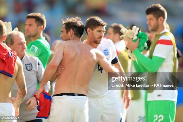 England's Frank Lampard and Steven Gerrard embrace after the final whistle during the FIFA World Cup, Group D match at the Estadio Mineirao, Belo...
