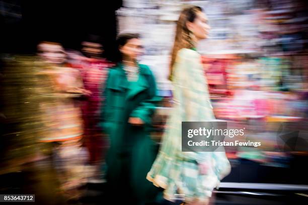 Models are seen backstage ahead of the Etro show during Milan Fashion Week Spring/Summer 2018 on September 22, 2017 in Milan, Italy.