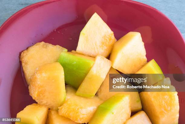 Healthy eating: Close-up of cantaloupe fruit salad. The fruit is also known as mushmelon, rockmelon, sweet melon, or spanspek refers to a variety of...