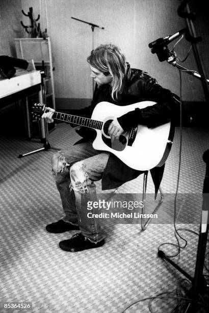 Photo of Kurt COBAIN and NIRVANA, Kurt Cobain recording in Hilversum Studios, playing Takamine acoustic guitar