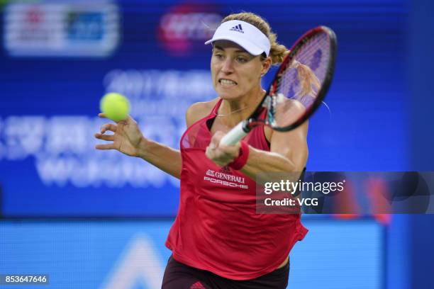 Angelique Kerber of Germany returns a shot during the first round match against Caroline Garcia of France on Day 2 of 2017 Dongfeng Motor Wuhan Open...