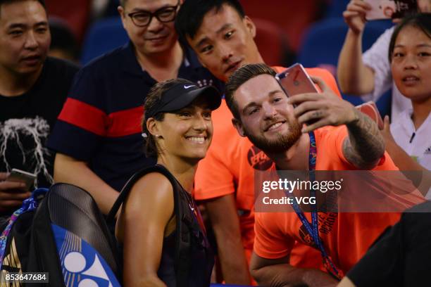 Caroline Garcia of France celebrates after winning the first round match against Angelique Kerber of Germany on Day 2 of 2017 Dongfeng Motor Wuhan...