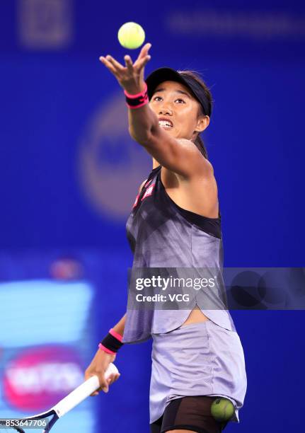 Zhang Shuai of China serves during the first round match against Donna Vekic of Croatia on Day 2 of 2017 Dongfeng Motor Wuhan Open at Optics Valley...