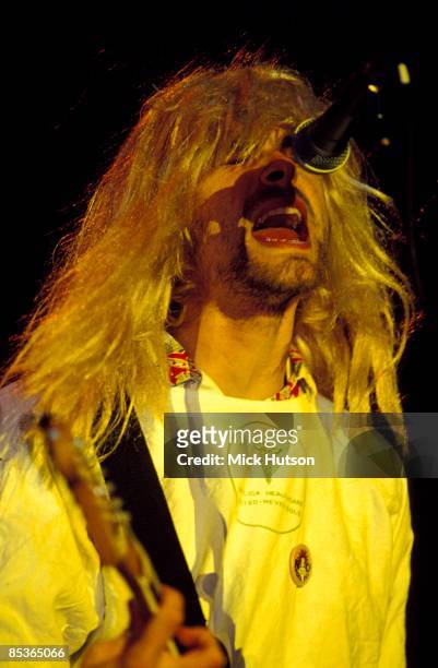Photo of Kurt COBAIN and NIRVANA, Kurt Cobain performing live onstage, wearing wig