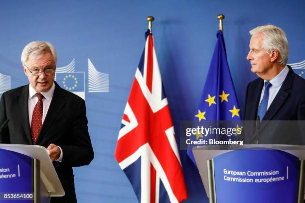 David Davis, U.K. Exiting the European Union secretary, left, speaks as Michel Barnier, chief negotiator for the European Union , listens during a...
