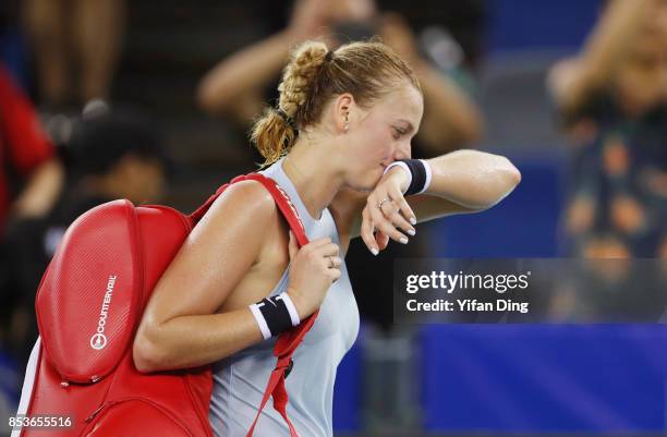 Petra Kvitova of Czech Republic walks off court following her defeat Ladies Singles maych against Peng Shuai of China in round 1 during Day 2 of 2017...